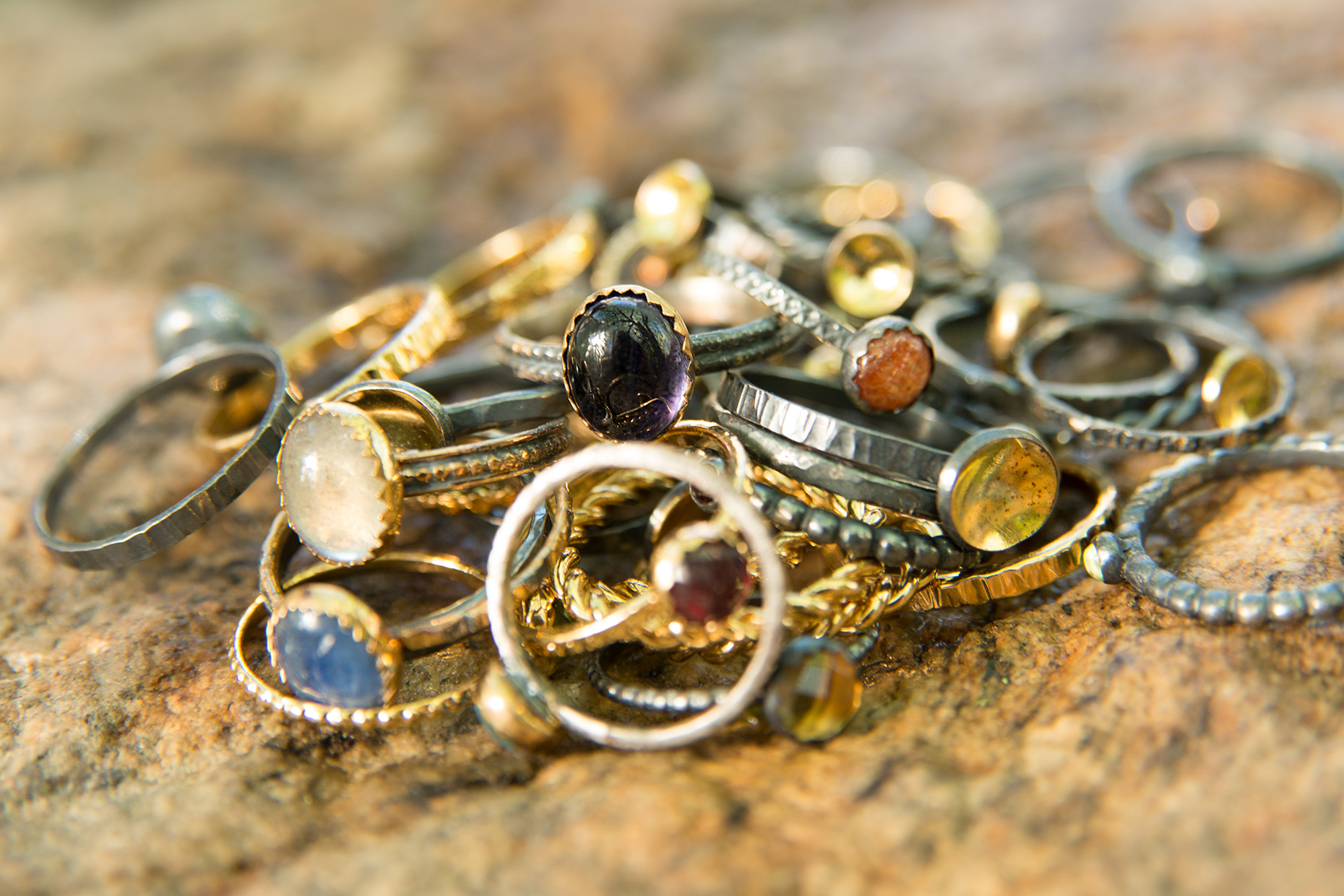 Photographer for product advertising pile of handmade gold rings