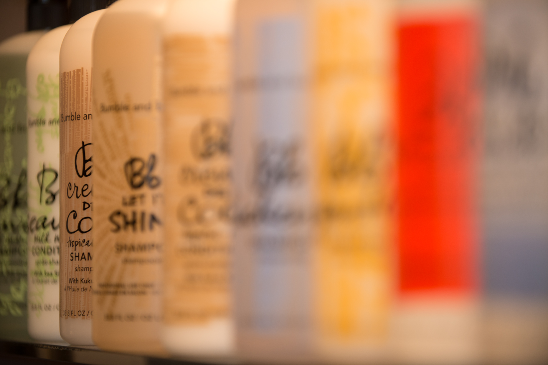 Website banner photographer Shampoo bottles in a hair salon 